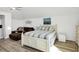 Bright bedroom featuring a bed, couch, and plenty of natural light at 310 Kettle Harbor Dr, Placida, FL 33946