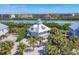 Stunning coastal home with a cupola, offering beautiful views and a serene waterfront setting at 310 Kettle Harbor Dr, Placida, FL 33946