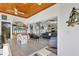 Bright and airy living area showcasing an open floor plan, with comfortable seating and nautical decor elements at 310 Kettle Harbor Dr, Placida, FL 33946