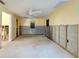 Bedroom with ceiling fan, damaged walls, and windows allowing ample natural light at 408 S Mccall Rd, Englewood, FL 34223