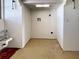 Interior shot of the laundry room with hook ups at 408 S Mccall Rd, Englewood, FL 34223