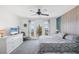 Inviting main bedroom with balcony access overlooking the water, featuring stylish decor and ample natural light at 4410 Warren Ave # 217, Port Charlotte, FL 33953
