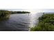 Scenic water view showcasing lush greenery and channel marker at 4410 Warren Ave # 217, Port Charlotte, FL 33953