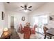 Cozy breakfast nook with glass table, themed chairs and sliding glass doors to outdoor patio at 52 Mariner Ln, Rotonda West, FL 33947