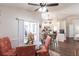 Open breakfast nook with seamless access to kitchen and direct views and access to lanai at 52 Mariner Ln, Rotonda West, FL 33947
