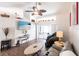 Relaxing living room with a ceiling fan, tile floors, and a view of the outdoor space at 52 Mariner Ln, Rotonda West, FL 33947