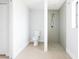 Bathroom featuring modern fixtures and a walk-in shower with glass at 5266 Cooper Ter, Port Charlotte, FL 33981