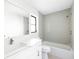 Clean bathroom featuring a shower, tub, and vanity with modern fixtures at 5266 Cooper Ter, Port Charlotte, FL 33981