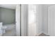 Bathroom and doorway with tiled floors, bathtub, and shower at 5266 Cooper Ter, Port Charlotte, FL 33981