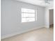 Bright and airy bedroom with large window and tiled floors at 5266 Cooper Ter, Port Charlotte, FL 33981
