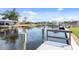This serene canal view features multiple docks, perfect for boating and enjoying the waterfront lifestyle at 5266 Cooper Ter, Port Charlotte, FL 33981
