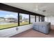 Waterfront views from the enclosed sunroom with a hot tub at 5266 Cooper Ter, Port Charlotte, FL 33981
