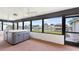 Enclosed sunroom with hot tub and waterfront views at 5266 Cooper Ter, Port Charlotte, FL 33981