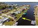 Waterfront property with a boat dock and canal access to the bay, ideal for boating enthusiasts at 5266 Cooper Ter, Port Charlotte, FL 33981