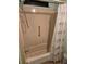 Shower and tub combination with shower curtain, safety bar, and clean, neutral finish at 6162 Redwing Ave, Englewood, FL 34224