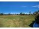 This property has a manicured lawn with access to a scenic golf course providing a serene environment at 62 Oakland Hills Pl, Rotonda West, FL 33947