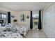 Bright bedroom featuring twin beds, nautical themed decor, and ample closet space at 62 Oakland Hills Pl, Rotonda West, FL 33947