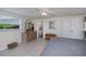 Bright bedroom with a window, dresser, and ensuite bathroom access at 62 Oakland Hills Pl, Rotonda West, FL 33947