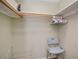 Walk-in closet with built-in shelving, providing ample storage and organization space at 62 Oakland Hills Pl, Rotonda West, FL 33947