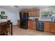 Kitchen with wood cabinets, stainless steel appliances, and granite countertops at 62 Oakland Hills Pl, Rotonda West, FL 33947
