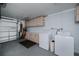 Functional laundry area with modern appliances and ample storage at 62 Oakland Hills Pl, Rotonda West, FL 33947