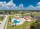 Beautiful aerial view of pool, recreation center, and surrounding community at 6375 Coniston St, Port Charlotte, FL 33981