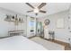 Bedroom with wooden floors, light-colored walls, and a desk for a cozy workspace at 6375 Coniston St, Port Charlotte, FL 33981