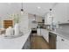 Modern kitchen featuring stainless steel appliances, stylish cabinetry, and a central island at 6375 Coniston St, Port Charlotte, FL 33981
