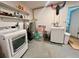 Utility room featuring a side-by-side washer and dryer at 6375 Coniston St, Port Charlotte, FL 33981