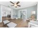Bright living room, open to screened lanai, with stylish furnishings and natural light at 6375 Coniston St, Port Charlotte, FL 33981