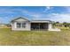 Charming single-story home featuring a screened lanai and well-maintained lawn at 6375 Coniston St, Port Charlotte, FL 33981