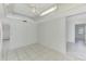 Bright room with tile flooring and neutral paint, offering a versatile space at 7215 Brookhaven Ter, Englewood, FL 34224