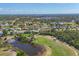 Panoramic view showing a golf course community featuring water canals and picturesque golf course views at 758 Rotonda Cir, Rotonda West, FL 33947