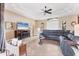 Comfortable living room featuring recessed lighting, neutral paint colors, and an entertainment center at 758 Rotonda Cir, Rotonda West, FL 33947
