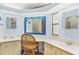 The bathroom features dual sinks, ample counter space, and bright natural light at 816 Tangerine Woods Blvd, Englewood, FL 34223