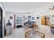 Open-concept living room with ample seating, lots of natural light and stylish decor at 816 Tangerine Woods Blvd, Englewood, FL 34223