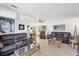 Spacious living area with comfortable sofas, modern flooring and stylish furnishings at 816 Tangerine Woods Blvd, Englewood, FL 34223