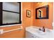 Compact bathroom with a white vanity and framed mirror at 850 Van Gogh Road, Englewood, FL 34223