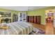 Spacious main bedroom with hardwood floors, and ample closet space at 850 Van Gogh Road, Englewood, FL 34223