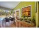 Outdoor kitchen and dining area offering views of the pool at 850 Van Gogh Road, Englewood, FL 34223