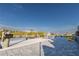 Waterfront dock featuring a sign that says 'Welcome to Our Dock', and tranquil water views at 9214 Melody Cir, Port Charlotte, FL 33981