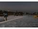 A waterfront dock featuring a sign that says 'Welcome to Our Dock', and tranquil water views at night at 9214 Melody Cir, Port Charlotte, FL 33981