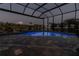 Screened pool with brick patio and views of the canal at 9214 Melody Cir, Port Charlotte, FL 33981