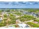 Planned community aerial view with single Gathering homes along canals and streets at 9283 Impala Cir, Port Charlotte, FL 33981