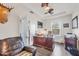 Office featuring desk, leather chair, and decorative mounted deer head at 9283 Impala Cir, Port Charlotte, FL 33981