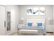 Comfortable bedroom featuring a cushioned headboard bed with blue accents and simple modern decor at Lot 16 Blk 266 Hadden Ter, North Port, FL 34287