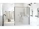 Elegant bathroom with a freestanding tub, marble walls, and modern fixtures at Lot 18 Blk 284 Wooley Ave, North Port, FL 34287