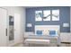Comfortable bedroom featuring stylish decor, a plush bed, and complementary nightstands with lamps at Lot 18 Blk 284 Wooley Ave, North Port, FL 34287