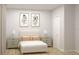 A beautifully staged bedroom features neutral tones, modern art, and minimalist bedside tables at Lot 18 Blk 284 Wooley Ave, North Port, FL 34287