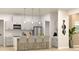 Modern kitchen features a waterfall island with seating, stainless appliances, and light gray cabinetry at Lot 18 Blk 284 Wooley Ave, North Port, FL 34287